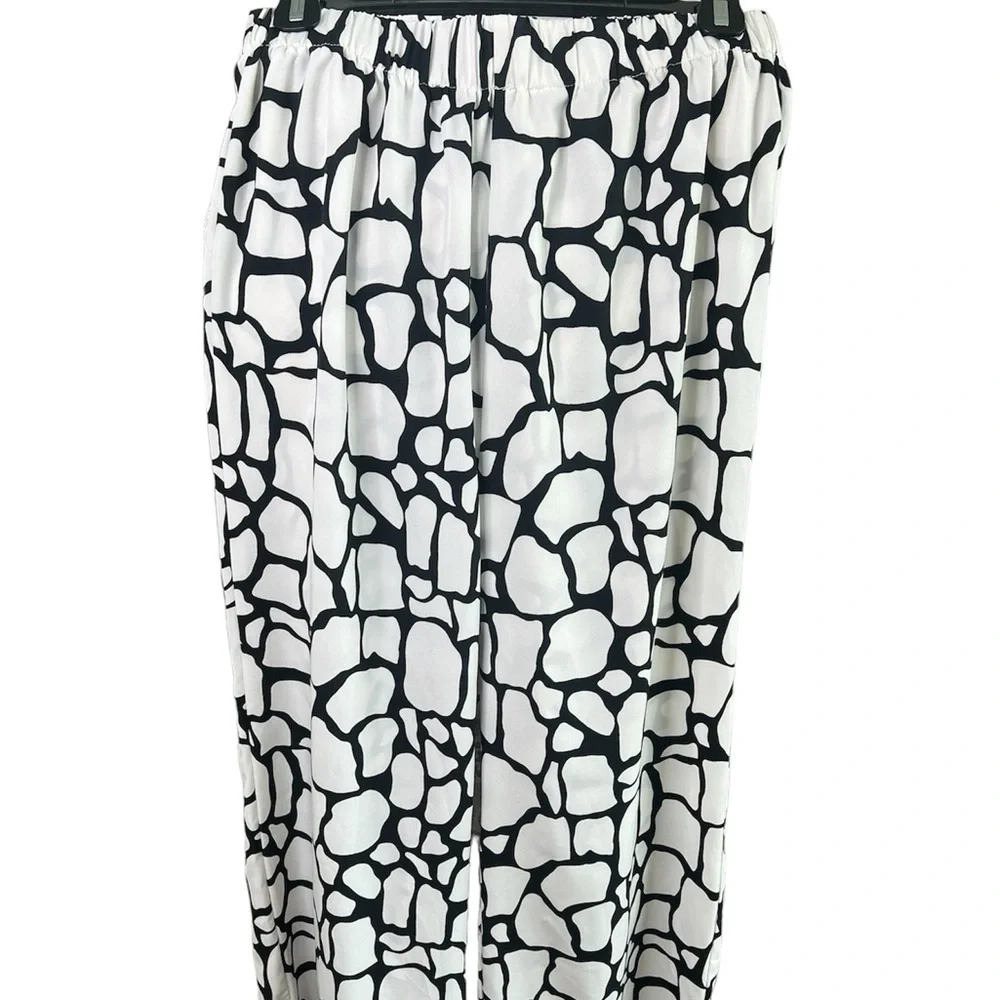 Women pants suits Allover print halter elegant Set.Sleeveless size Medium.